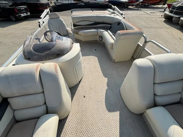 Slide: The Image of 2007 Bennington 2275RL pontoon boat interior with seating and helm. - 7