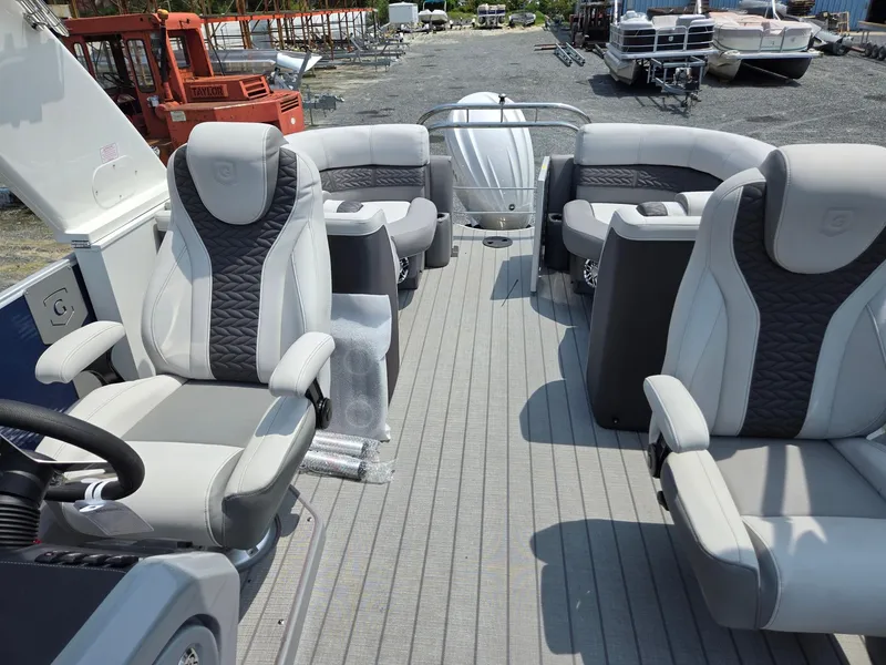 Slide: The Image of Interior of 2025 Godfrey Monaco 235 SB pontoon boat with luxurious seating. - 11