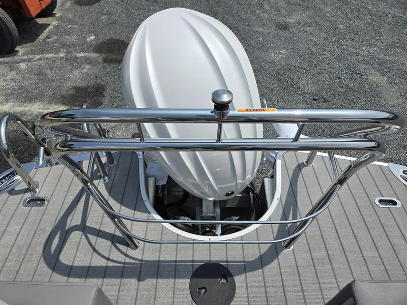 Slide: The Image of 2025 Godfrey Monaco 235 SB boat engine and rear deck view. - 23
