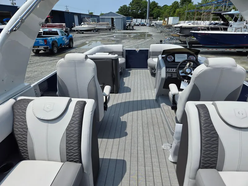Slide: The Image of Interior of 2025 Godfrey Monaco 235 SB pontoon boat with luxurious seating. - 26
