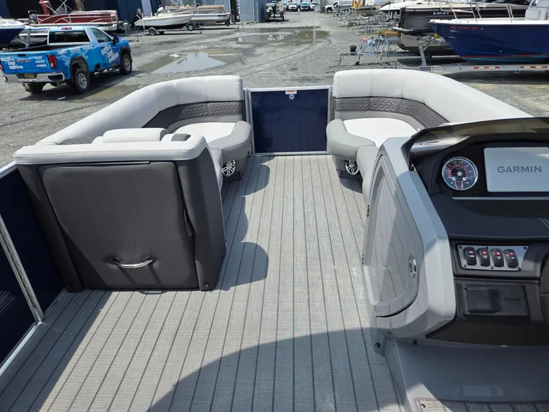 Slide: The Image of Interior of 2025 Godfrey Monaco 235 SB pontoon boat with modern seating and Garmin navigation. - 29