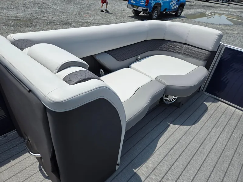 Slide: The Image of 2025 Godfrey Monaco 235 SB pontoon boat seating area with gray and white upholstery. - 35