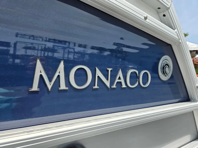 Slide: The Image of 2025 Godfrey Monaco 235 SB boat nameplate. - 37