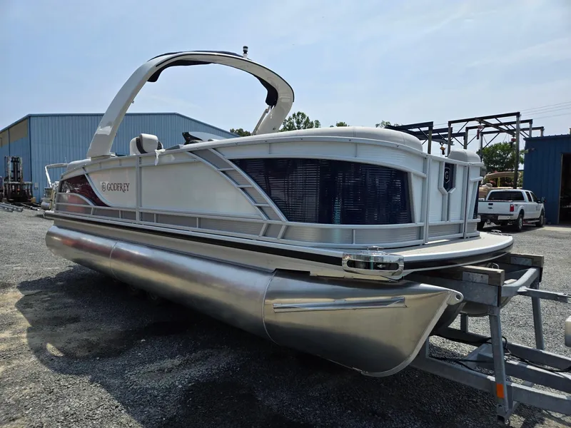 Slide: The Image of 2025 Godfrey Monaco 235 SB pontoon boat on a trailer. - 6