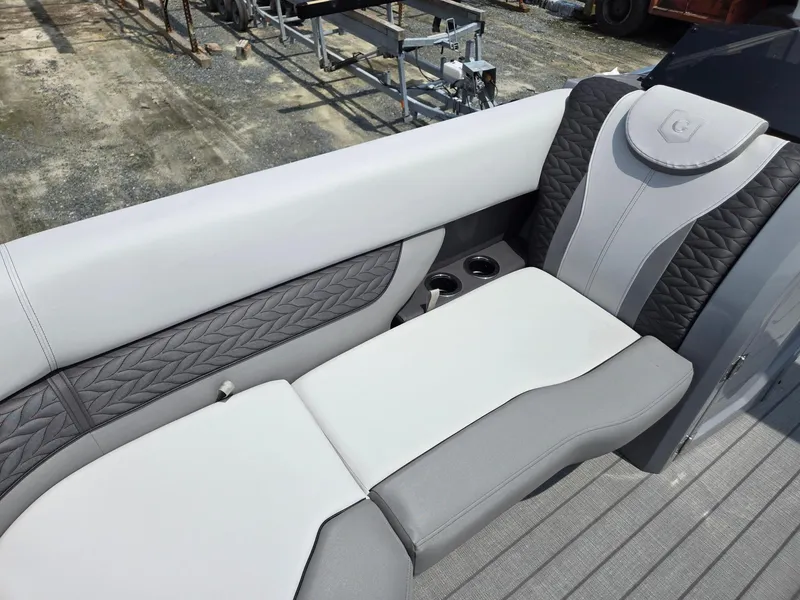 Slide: The Image of Luxurious seating on the 2025 Godfrey Monaco 235 SB pontoon boat. - 9