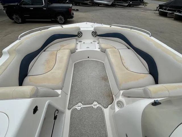 Slide: The Image of 2007 Hurricane 202FD boat interior with spacious seating and storage compartments. - 15