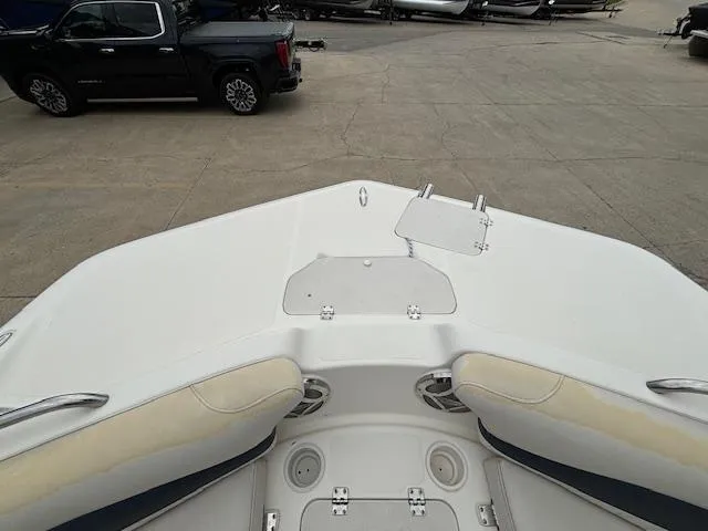 Slide: The Image of Bow view of 2007 Hurricane 202FD boat with seating and storage compartments. - 18
