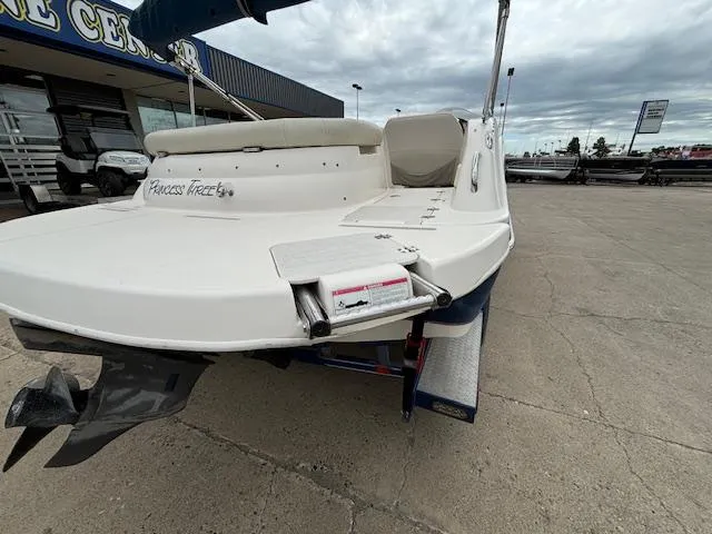 Slide: The Image of 2007 Hurricane 202FD boat at a dealership, rear view. - 6