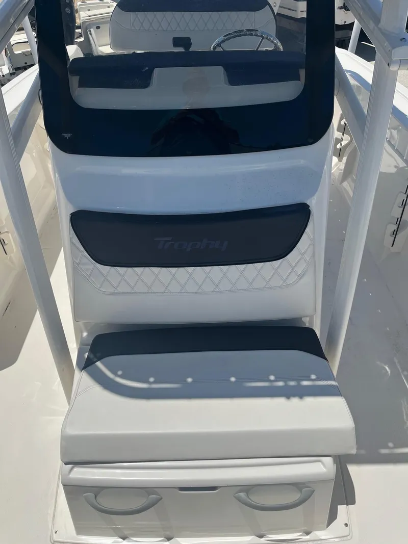 Slide: The Image of 2022 Bayliner Trophy T22CC center console seating and storage. - 4