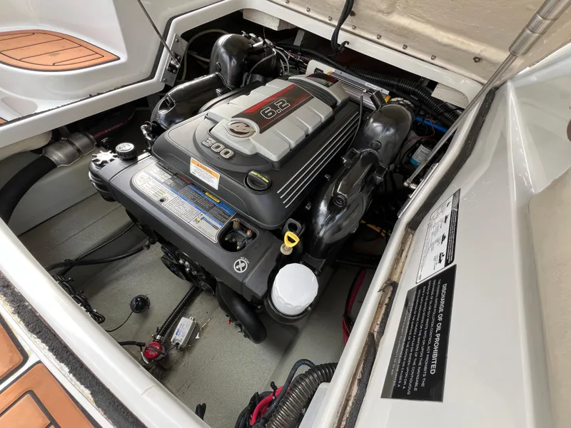 Slide: The Image of Engine compartment of a 2016 Crownline 270 SS boat, featuring a 6.2L 300 HP engine. - 26