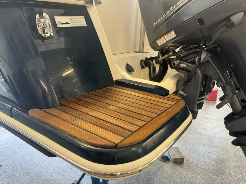 Slide: The Image of 2014 Scout 275 Dorado boat with Yamaha outboard motor and teak swim platform. - 16