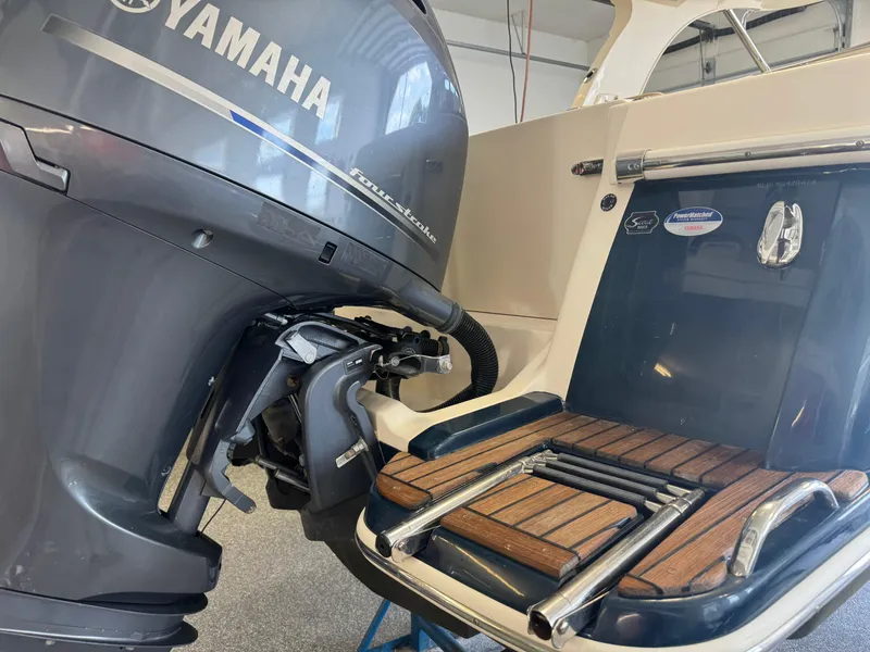Slide: The Image of 2014 Scout 275 Dorado boat with Yamaha outboard motor and teak swim platform. - 18