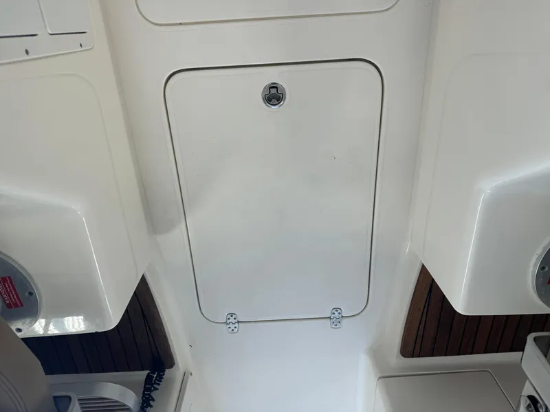 Slide: The Image of 2014 Scout 275 Dorado boat interior storage compartment. - 38