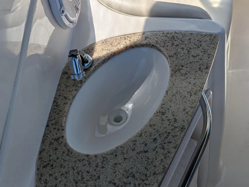 Slide: The Image of Granite countertop with sink in 2011 Chaparral Signature 270 boat. - 29