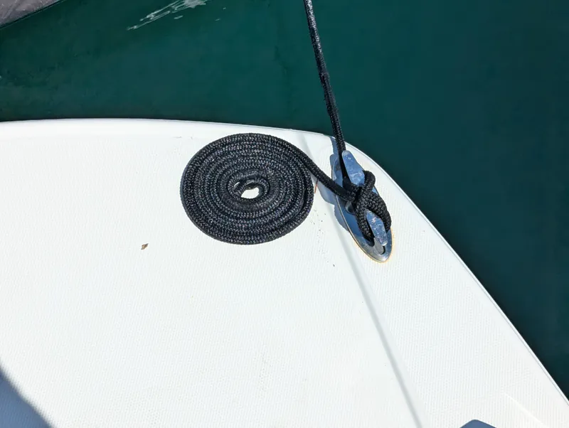 Slide: The Image of Coiled rope on the deck of a 2011 Chaparral Signature 270 boat. - 41