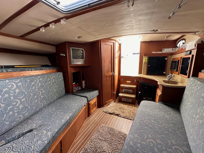 Slide: The Image of 2006 Albemarle 320 Express Fisherman docked at a marina. - 13