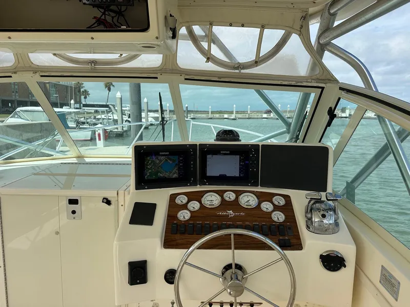 Slide: The Image of 2006 Albemarle 320 Express Fisherman docked at a marina. - 3