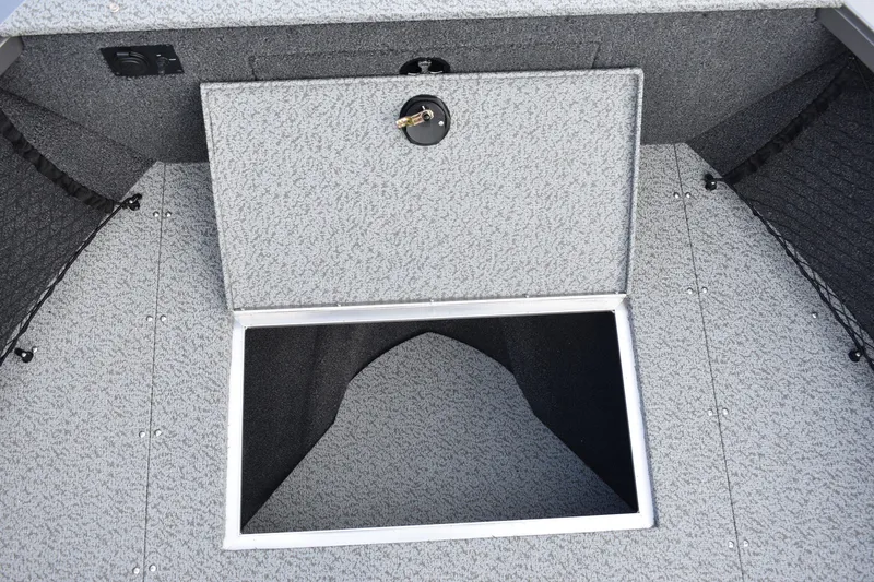 Slide: The Image of 2023 Crestliner 2250 Authority storage compartment with open hatch. - 10