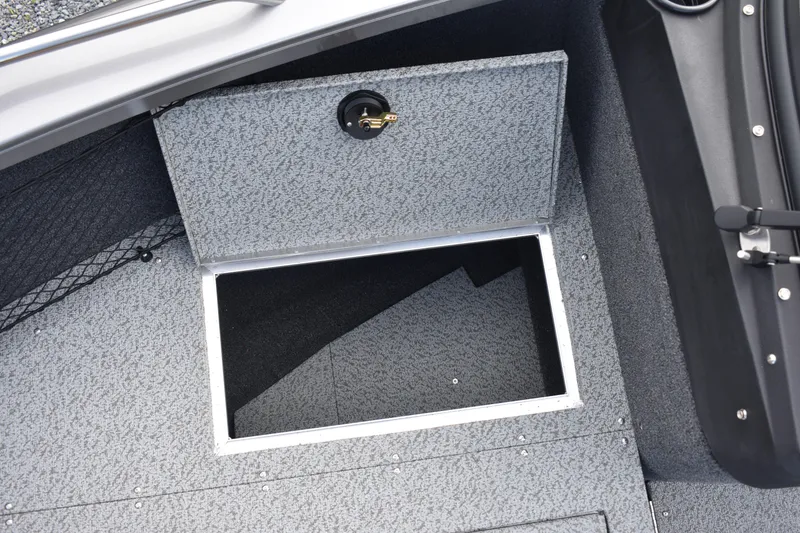 Slide: The Image of 2023 Crestliner 2250 Authority storage compartment with open hatch. - 11