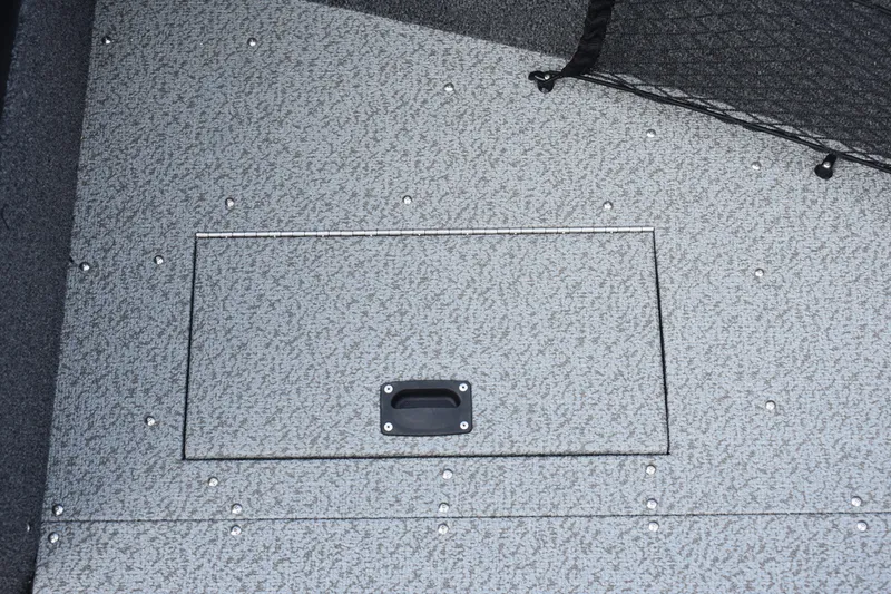 Slide: The Image of 2023 Crestliner 2250 Authority boat storage compartment with handle. - 12
