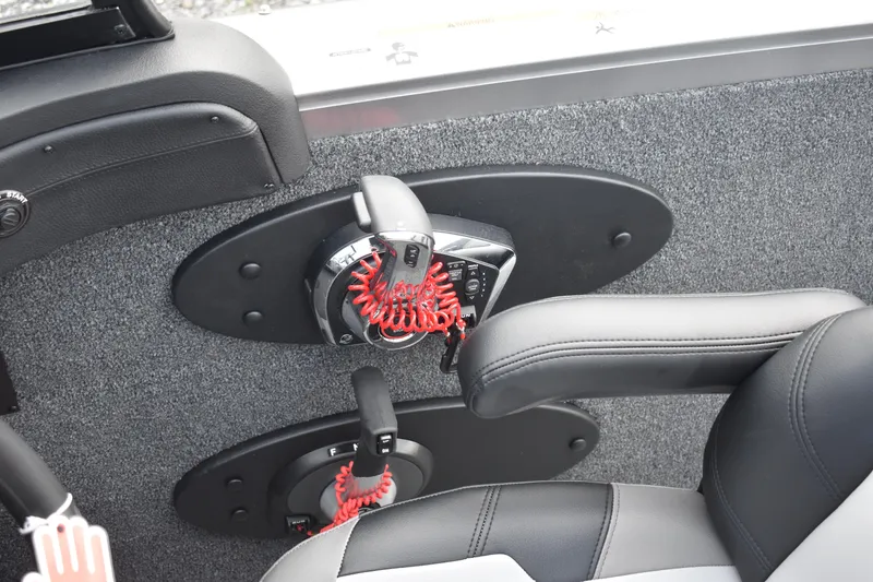 Slide: The Image of 2023 Crestliner 2250 Authority boat interior control panel and seat. - 20