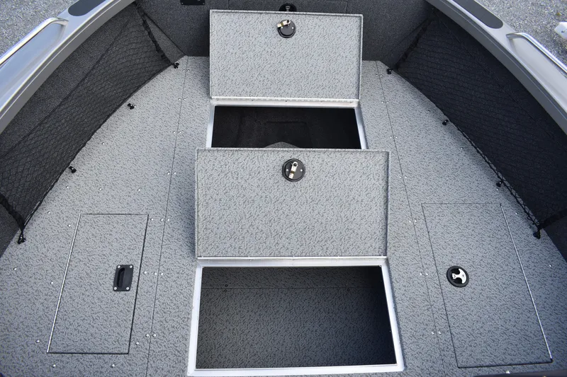 Slide: The Image of 2023 Crestliner 2250 Authority boat with open storage compartments. - 8