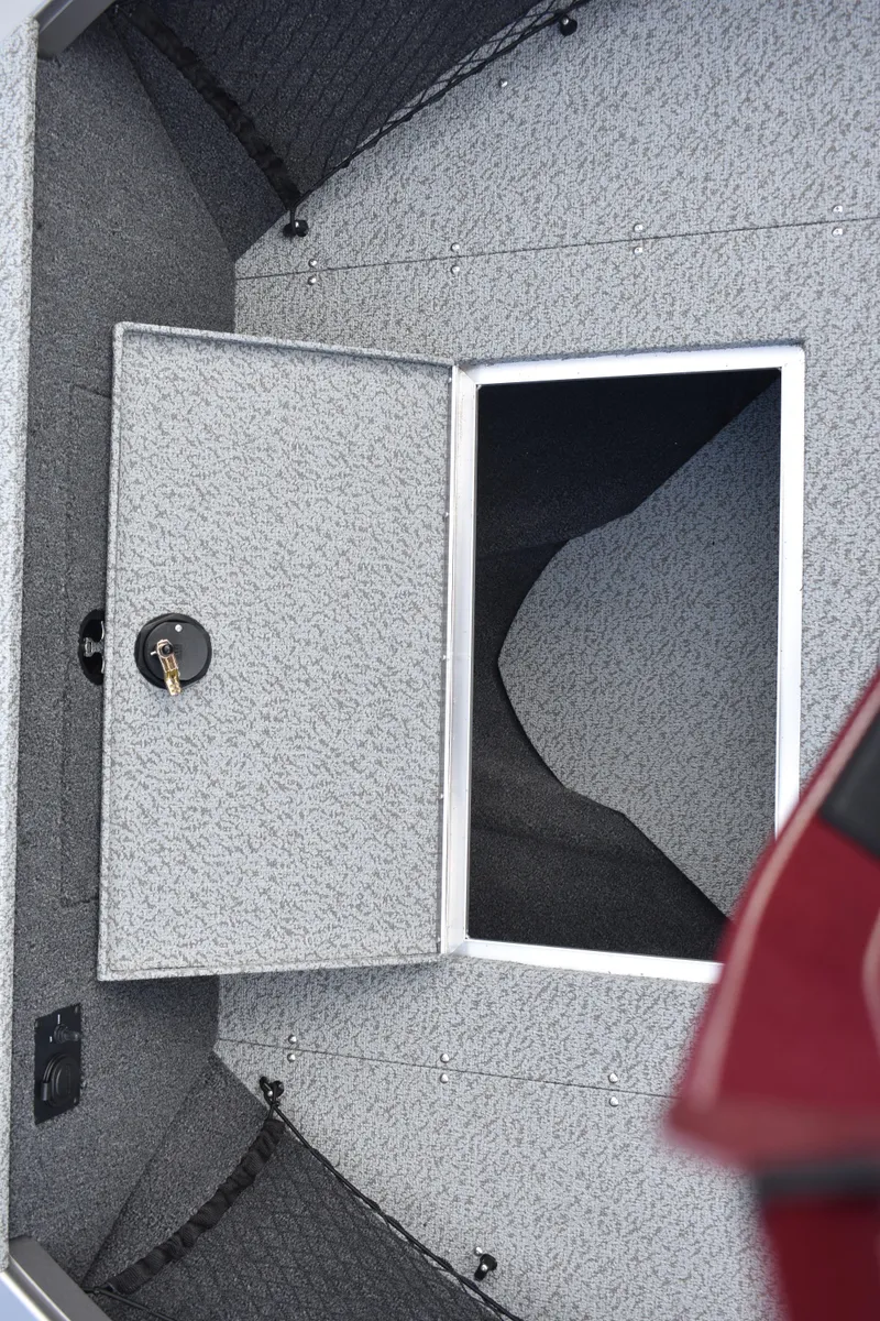 Slide: The Image of 2023 Crestliner 2250 Authority boat storage compartment with lock. - 9
