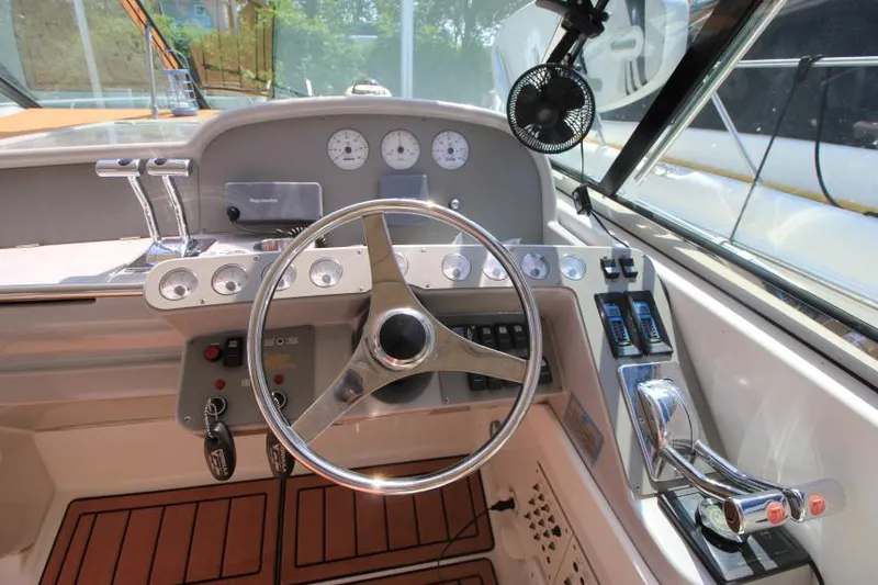 Slide: The Image of 2001 Formula 41 PC boat helm with steering wheel and control panel - 14
