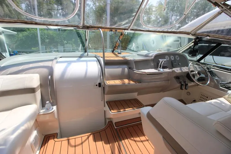 Slide: The Image of Interior of a 2001 Formula 41 PC yacht with teak flooring and helm station. - 16