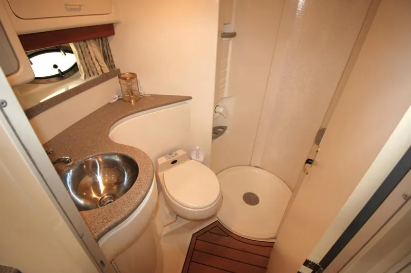 Slide: The Image of 2001 Formula 41 PC yacht bathroom with sink, toilet, and shower. - 20