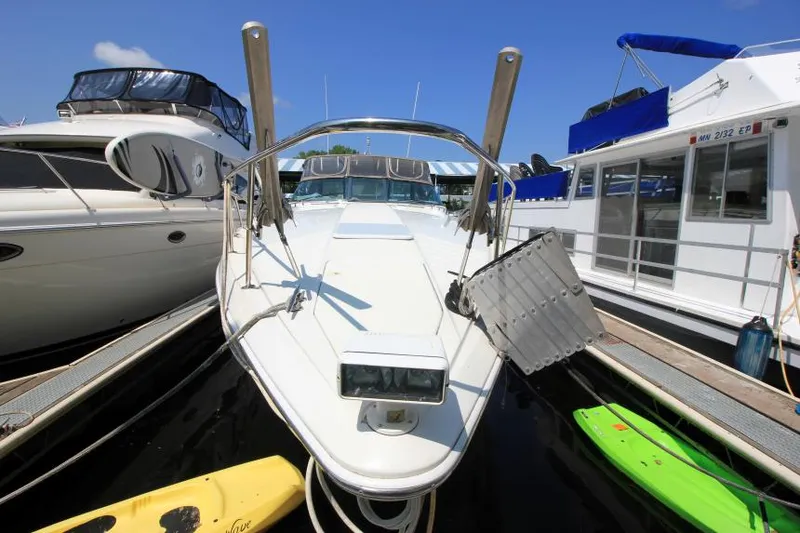 Slide: The Image of 2001 Formula 41 PC yacht docked between other boats. - 3