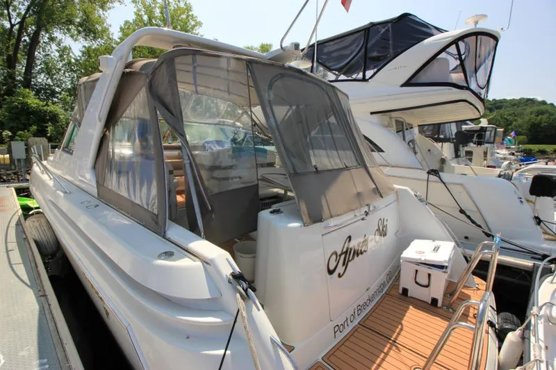 Slide: The Image of 2001 Formula 41 PC yacht docked at marina with covered cockpit. - 6