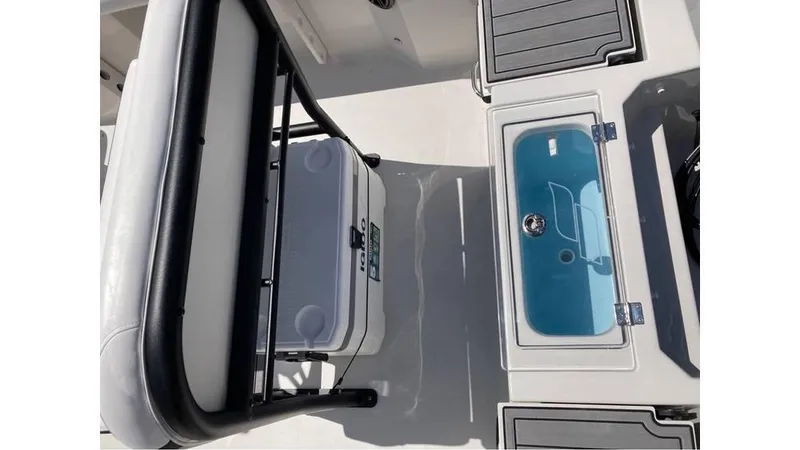 Slide: The Image of 2024 Starcraft SVX 191 OB CC boat interior with seating and storage compartments. - 6