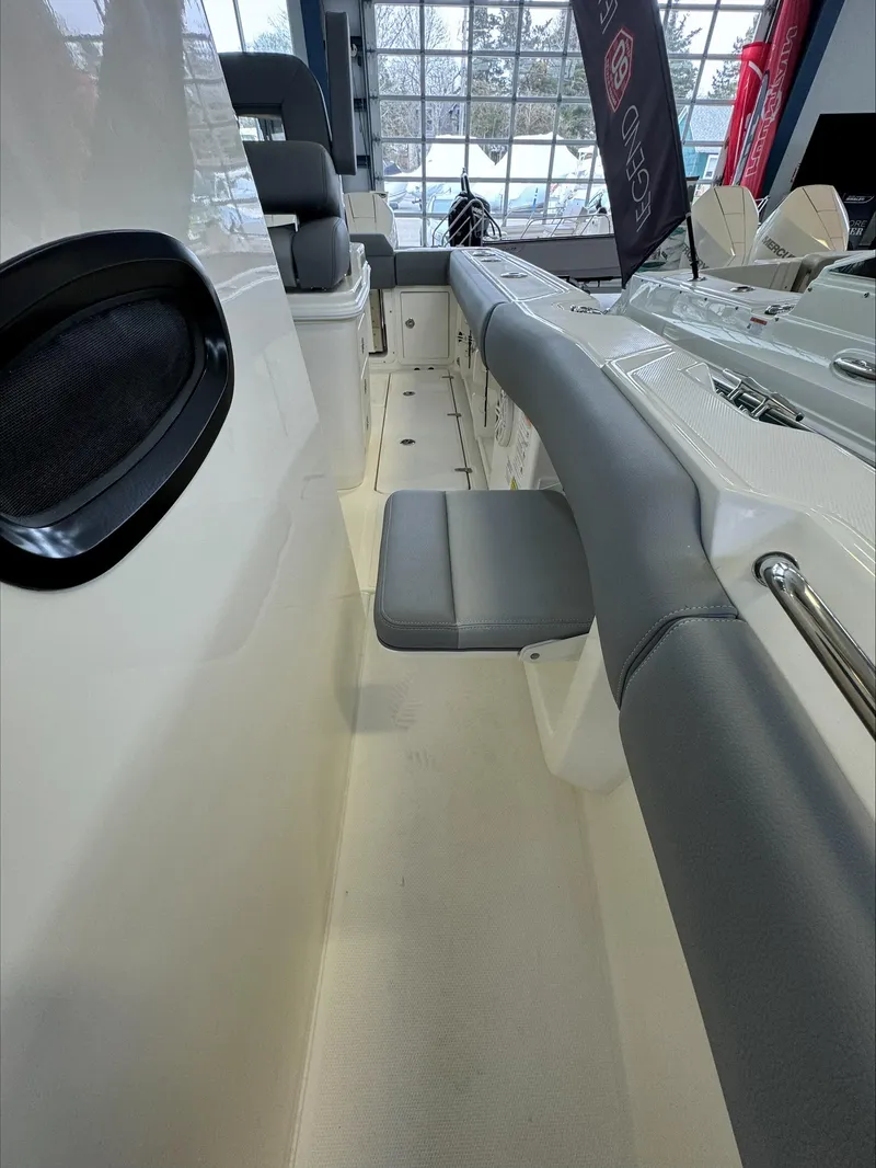 Slide: The Image of 2025 Boston Whaler 250 Outrage interior, showcasing sleek seating and modern design. - 17