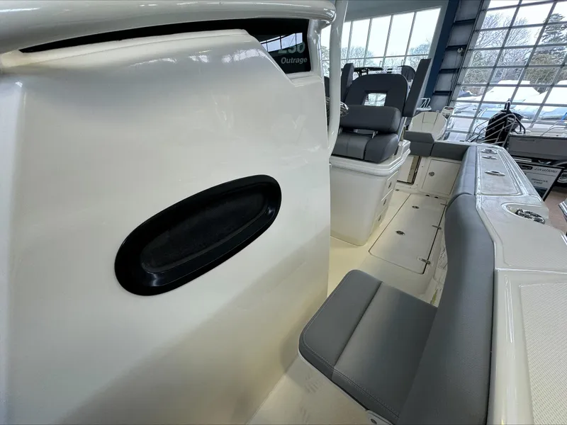 Slide: The Image of 2025 Boston Whaler 250 Outrage interior with seating and console details. - 18