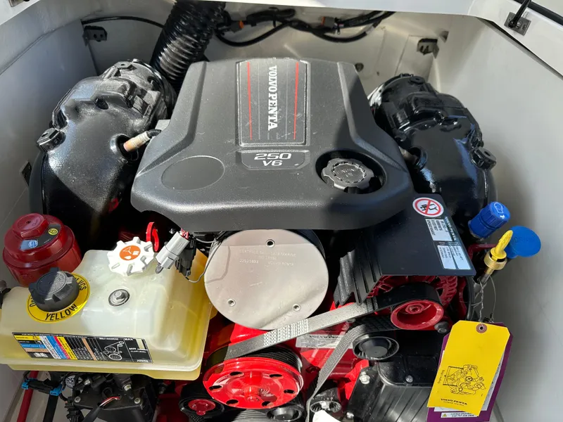 Slide: The Image of 2024 Cobalt CS22 boat engine compartment with Volvo Penta 250 V8 engine. - 10