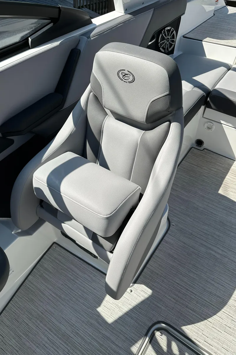 Slide: The Image of 2024 Cobalt CS22 boat with luxurious gray captain's seat. - 12