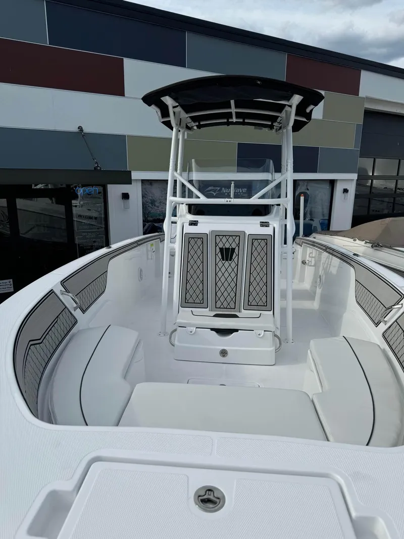 Slide: The Image of 2025 Wellcraft 202 Fisherman boat with T-top and spacious deck. - 6