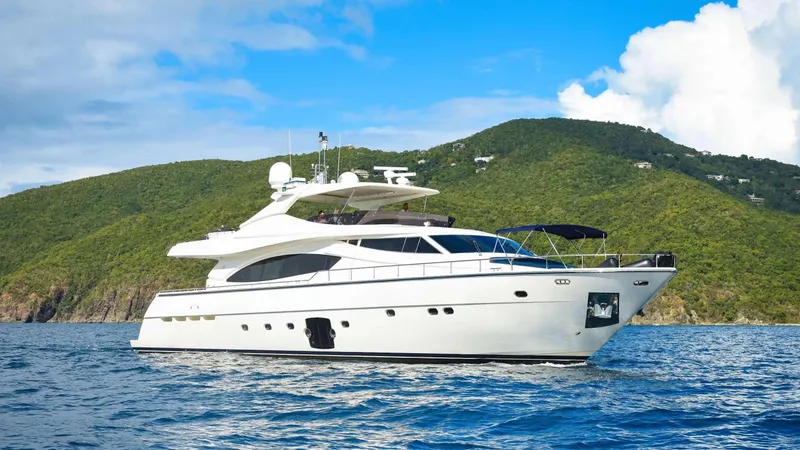 Slide: The Image of Luxury 2006 Ferretti Yachts 881 cruising near lush green island. - 0