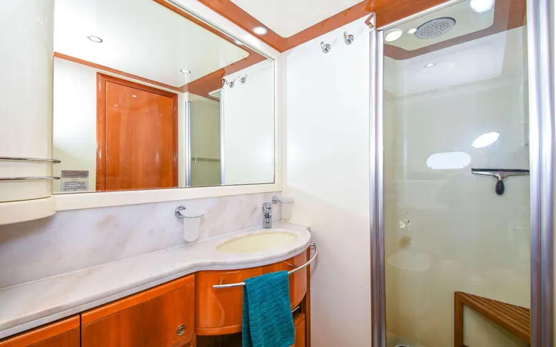 Slide: The Image of Luxurious bathroom in 2006 Ferretti Yachts 881, featuring modern fixtures and elegant design. - 15