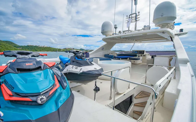 Slide: The Image of Luxury 2006 Ferretti Yachts 881 with jet skis on deck, ocean view. - 5
