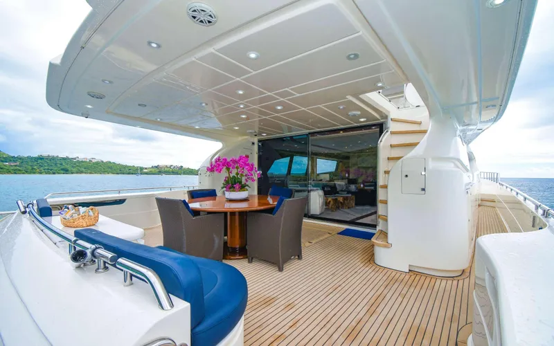 Slide: The Image of Luxurious 2006 Ferretti Yachts 881 with elegant deck seating and ocean view. - 6