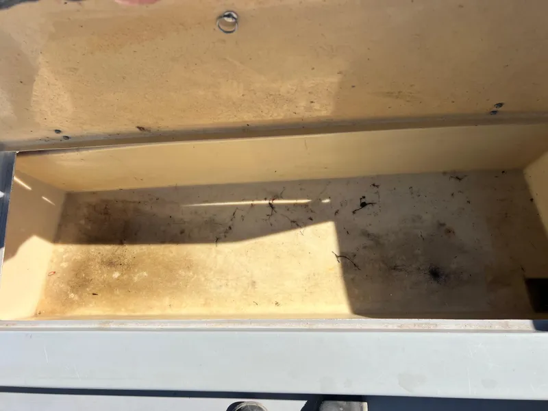 Slide: The Image of Open storage compartment of 1986 Wellcraft 20 SPORT FISH boat. - 13