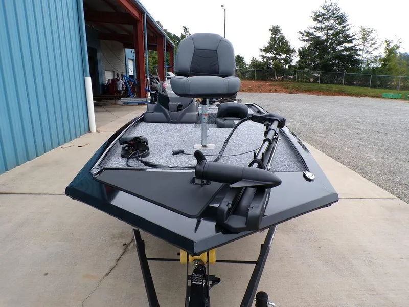 Slide: The Image of 2025 Tracker Pro 170 boat on display, featuring a sleek design and modern seating. - 3