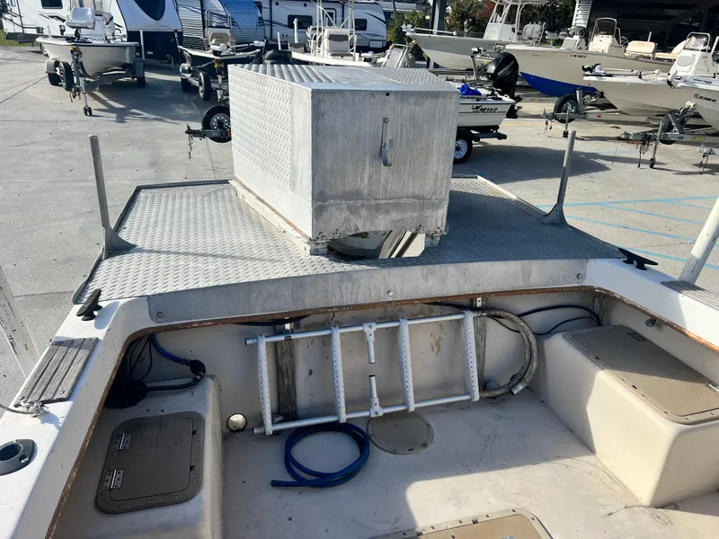 Slide: The Image of 1984 Dusky 233 boat on trailer at The Boat Yard. - 27