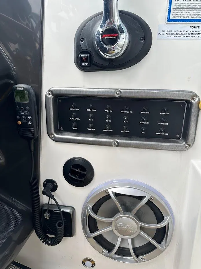 Slide: The Image of 2019 Monterey 295 SY boat control panel with speaker and radio. - 21