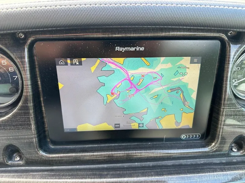 Slide: The Image of Raymarine navigation display on 2019 Monterey 295 SY boat dashboard. - 22