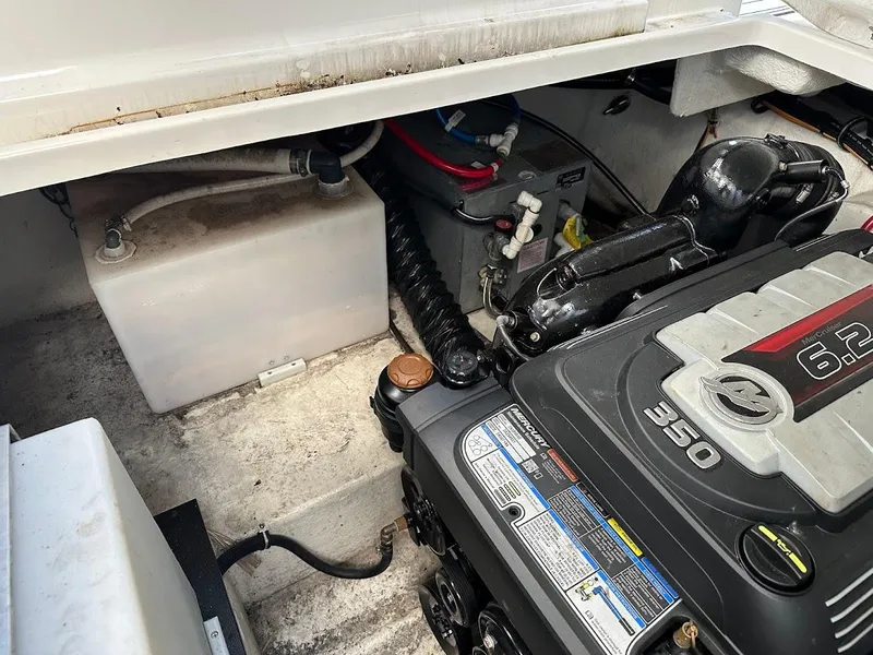 Slide: The Image of 2019 Monterey 295 SY engine compartment with 6.2L 350 horsepower engine. - 25