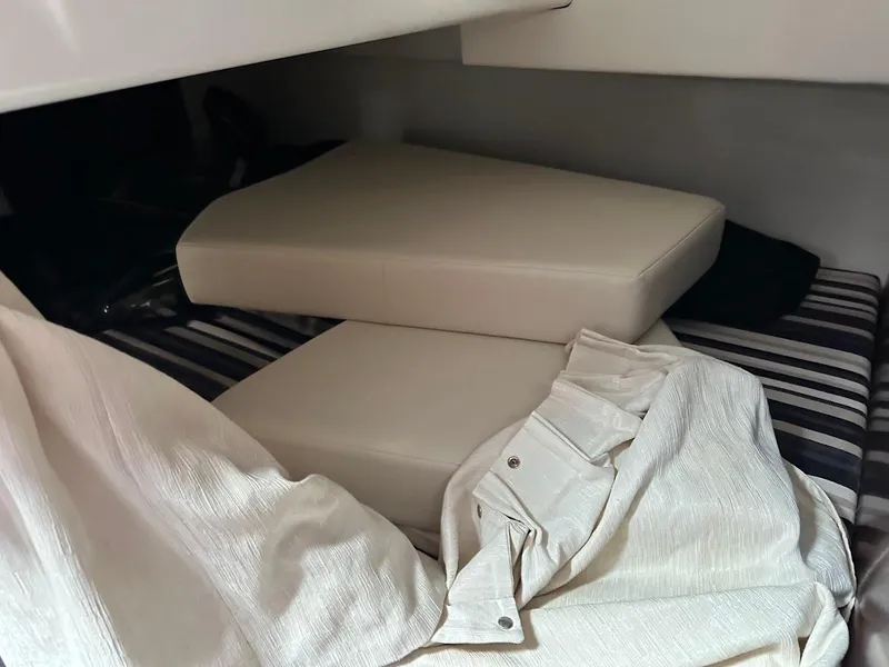 Slide: The Image of Interior cabin of 2019 Monterey 295 SY boat with cushions and bedding. - 30