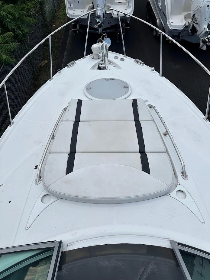 Slide: The Image of 2019 Monterey 295 SY boat deck with sun pad and railing. - 36